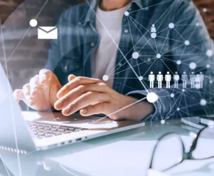 KINETICS contact Male hands with laptop. Concept of networking or remote working.